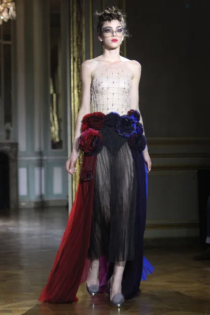 A model wears a creation for Ulyana Sergeenko's fall-winter 2015/2016 Haute Couture fashion collection presented in Paris, France, Sunday, July 5, 2015. (Photo by Thibault Camus/AP Photo)