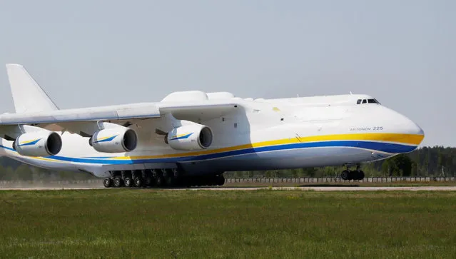 Antonov An-225 Mriya, a cargo plane which is the world's biggest aircraft, takes off from an airfield for its first commercial flight to the Australian city of Perth, in the settlement of Hostomel outside Kiev, Ukraine, May 10, 2016. (Photo by Valentyn Ogirenko/Reuters)