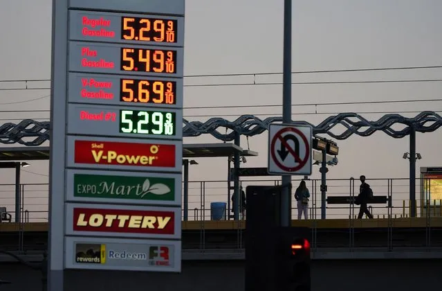 Gas prices are advertised at over five dollars a gallon Monday, February 28, 2022, in Los Angeles. (Photo by Marcio Jose Sanchez/AP Photo)