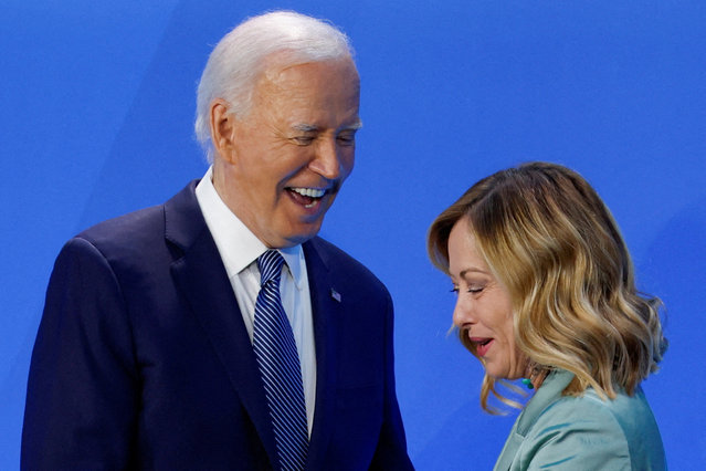 U.S. President Joe Biden greets Italy's Prime Minister Giorgia Meloni, as they attend NATO's 75th anniversary summit in Washington on July 10, 2024. (Photo by Evelyn Hockstein/Reuters)