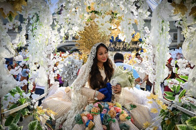 A woman participates in Santacruzan, an annual parade that celebrates the Holy Cross, in Manila on May 30, 2024. (Photo by Jam Sta Rosa/AFP Photo)