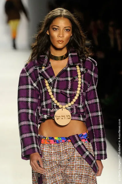 A model walks the runway at the Popluxe Fall 2012 fashion show during Mercedes-Benz Fashion Week