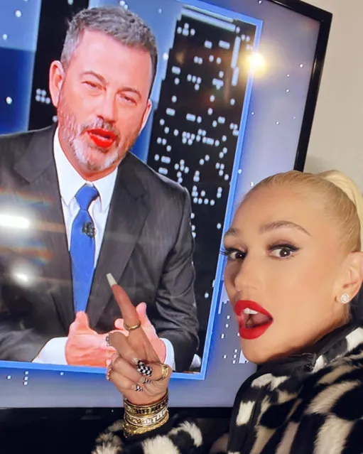 American singer-songwriter Gwen Stefani gives American television host Jimmy Kimmel a kiss at “Jimmy Kimmel Live!” on March 24, 2022 in Los Angeles, California. (Photo by gwenstefani/Instagram)