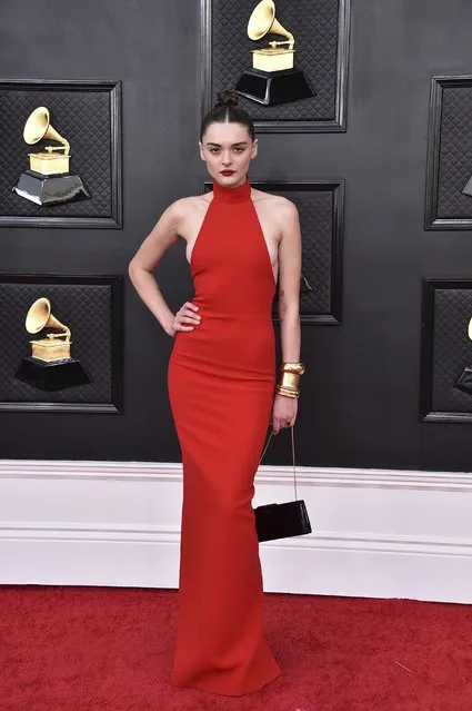 American singer Charlotte Lawrence arrives at the 64th Annual Grammy Awards at the MGM Grand Garden Arena on Sunday, April 3, 2022, in Las Vegas. (Photo by Jordan Strauss/Invision/AP Photo)