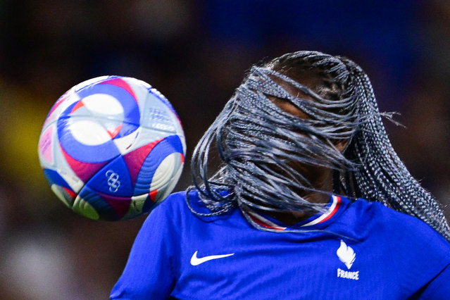 France's forward #11 Kadidiatou Diani eyes the ball during the women's group A football match between France and Colombia during the Paris 2024 Olympic Games at the Lyon Stadium in Lyon on July 25, 2024. (Photo by Olivier Chassignole/AFP Photo)