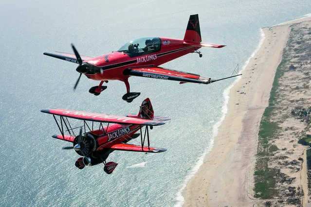 Pilots from the John Klatt Airshows team practice for the annual Jones Beach Memorial Day Air Show in Long Island, New York City on May 26, 2016. (Photo by Splash News)