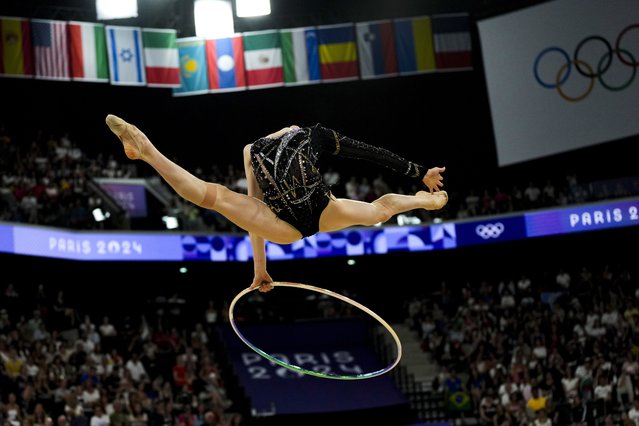 Data Varfjlomeev, of Germany performs in the rhythmic gymnastics individuals all-round qualification round, at La Chapelle Arena at the 2024 Summer Olympics, Thursday, August 8, 2024, in Paris, France. (Photo by Francisco Seco/AP Photo)