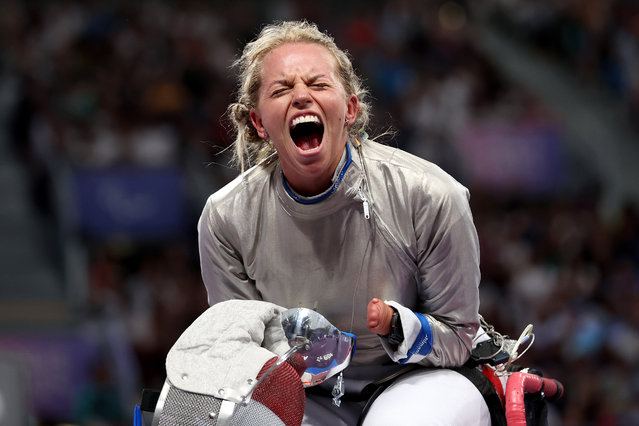 Kinga Drozdz of Team Poland reacts against Xufeng Zou of Team China during the Women's Sabre Category A quarterfinals on day six of the Paris 2024 Summer Paralympic Games at Grand Palais on September 03, 2024 in Paris, France. (Photo by Steph Chambers/Getty Images)