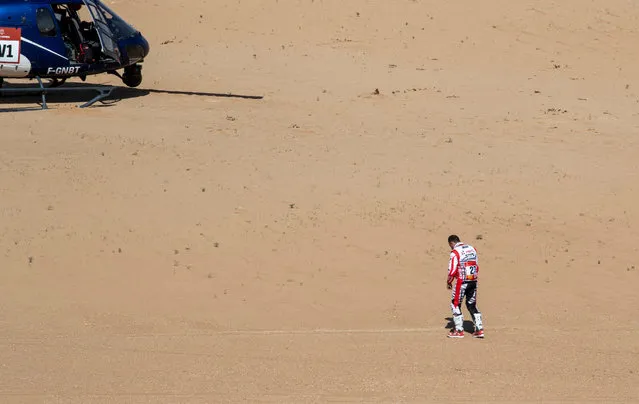 Portuguese Joaquim Rodrigues reacts after the death of his team member Paulo Goncalves who died at the kilometer 276 after a fall, during the stage seven of the Rally Dakar 2020 between Riyadh and Wadi Al-Dawasir in Saudi Arabia, 12 January 2020. The Rally Dakar takes place in Saudi Arabia from 05 to 17 January 2020. (Photo by Andre Pain/EPA/EFE)