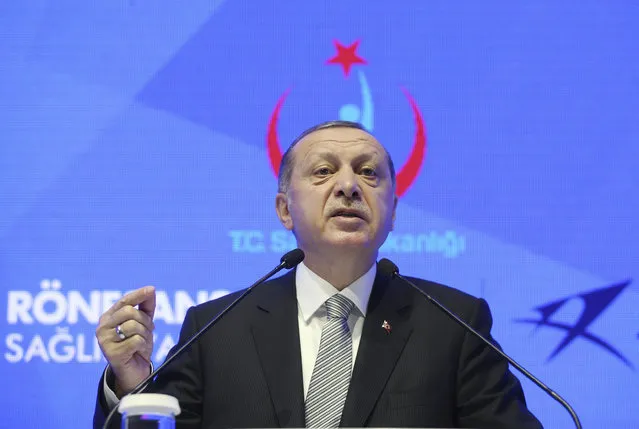 Turkey's President Recep Tayyip Erdogan speaks during a meeting in Istanbul, Friday, July 21, 2017. Erdogan has accused Germany's government of trying to scare off investments to Turkey with lies, after Germany toughened its stance toward Ankara following the arrest of human rights activists, including a German national.(Photo by Presidential Press Service/Pool photo via AP Photo)