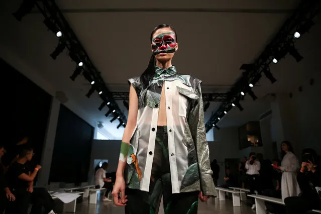 A model presents a creation from the Liu Bolin Debut collection during New York Fashion Week in the Manhattan borough of New York City, U.S., September 10, 2017. (Photo by Amr Alfiky/Reuters)