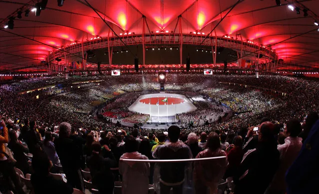 The Japanese flag is created during the closing ceremony in the Maracana stadium at the 2016 Summer Olympics in Rio de Janeiro, Brazil, Sunday, August 21, 2016. (Photo by Charlie Riedel/AP Photo)