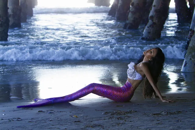 Lily Ghalichi as a Project Mermaids model. Project Mermaids lets ocean-lovers don tails and live out their siren fantasies. Clients can pay for a shoot that is either on land or underwater, with the images looking to raise awareness about preservation of beaches, seas and oceans. The project – which is shot by photographers Angelina Venturella and Chiara Salomoni – started purely to raise awareness, with celebrities dressing up as sirens as part of the cause. (Photo by Angelina Venturella/Chiara Salomoni/Caters News Agency)