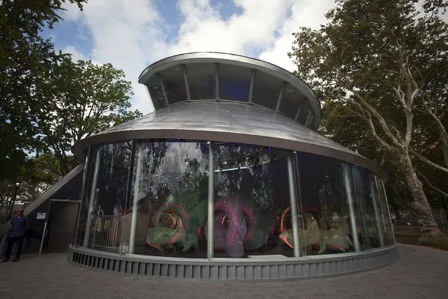 The new “Sea Glass” carousel is pictured at Battery Park in the Manhattan borough of New York, August 19, 2015. (Photo by Carlo Allegri/Reuters)