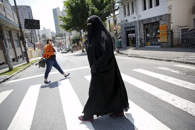 Gisele Marie, a Muslim woman and professional heavy metal musician, crosses a street after a rehearsal at a studio in Sao Paulo September 15, 2015. (Photo by Nacho Doce/Reuters)