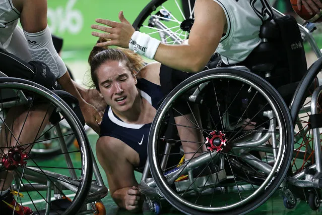 United States' Rebecca Murray falls during a women's gold medal wheelchair basketball game against Germany at the Paralympic Games in Rio de Janeiro, Brazil, Friday, September 16, 2016. United States won the gold. (Photo by Silvia Izquierdo/AP Photo)