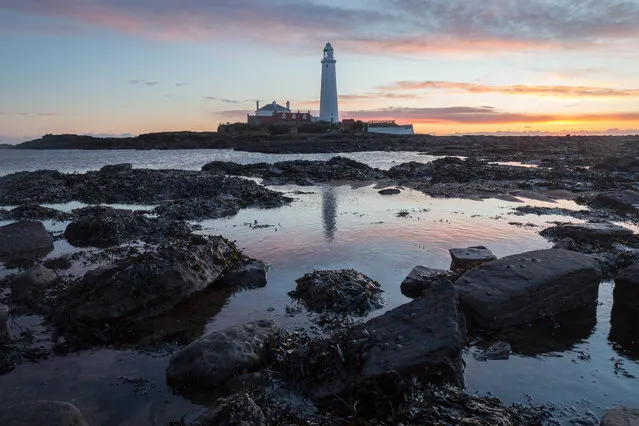 A winter sunrise at St Mary's Lighthouse on February 12, 2018 in Whitley Bay, England. The lighthouse was built in 1898 and remained operational until 1984. (Photo by Tom White/Getty Images)