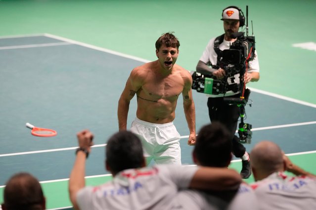 Italy's Flavio Cobolli celebrates after winning against Belgium's Zizou Bergs during a Davis Cup singles semifinal match between Italy and Belgium, in Bologna, Italy, Friday, November 21, 2025. (Photo by Luca Bruno/AP Photo)