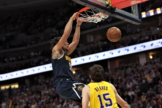Aaron Gordon #50 of the Denver Nuggets dunks during the third quarter against the Los Angeles Lakers in game two of the Western Conference Finals at Ball Arena on May 18, 2023 in Denver, Colorado. (Photo by Matthew Stockman/Getty Images)