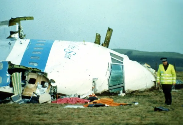 On December 21, 1988, Pan Am Flight 103 from London's Heathrow International Airport to New York's John F. Kennedy International Airport was destroyed and the remains landed in and around the town of Lockerbie, Scotland. Forensic experts determined that plastic explosive had been detonated in the Boeing 747-121 forward cargo hold. The death toll was 270 people from 21 countries, including 11 people in the town of Lockerbie. (Photo by AP Photo)