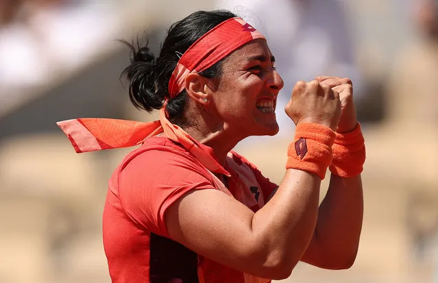 Ons Jabeur of Tunisia celebrates defeating Bernarda Pera of United States during the Women's Singles Fourth Round match on Day Nine of the 2023 French Open at Roland Garros on June 05, 2023 in Paris, France. (Photo by Julian Finney/Getty Images)