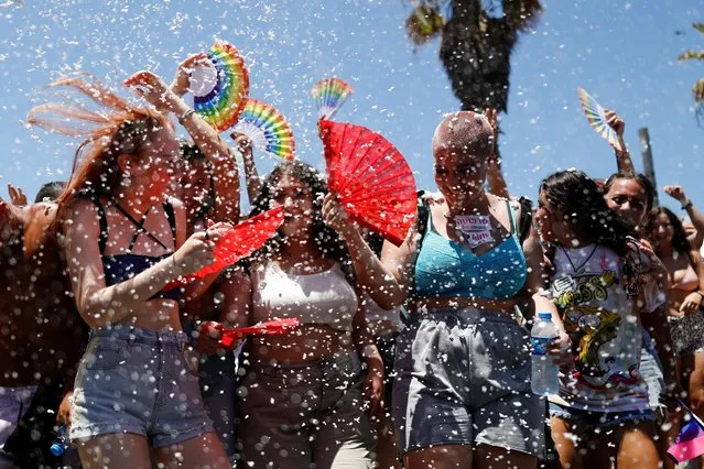 People take part in an annual gay pride parade in Tel Aviv, Israel on June 25, 2021. (Photo by Corinna Kern/Reuters)