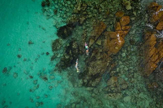 Turquoise lane. An aerial view of athletes on the Trans Cape SwimRun event in the turquoise waters of Castle Bay, Western Australia. (Photo by Daniela Tommasi/Women in Sport Photo Action Awards 2021)