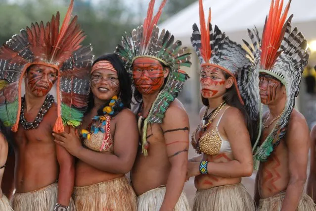 Brazilian indigenous participate in opening ceremony of XII Brazilian Indigenous Games in Cuiaba, Brazil, 09 November 2013. 1600 indigenous from 48 Brazilian ethnic groups will compete in ten traditional disciplines. (Photo by Fernando Bizerra Jr./EPA)
