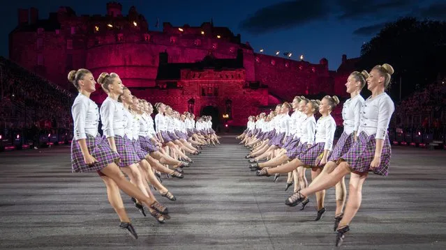 Highland dancers perform on Thursday, August 4, 2022 on the Esplanade of Edinburgh Castle at this year's Royal Edinburgh Military Tattoo. After a two-year hiatus the Tattoo returns with the 2022 show titled “Voices” with over 800 performers and includes international performances from Mexico, The United States, Switzerland and New Zealand. (Photo by Jane Barlow/PA Images via Getty Images)