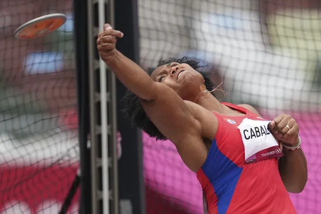 Denia Caballero, of Cuba, competes during the qualification round of the women's discus throw at the 2020 Summer Olympics, Saturday, July 31, 2021, in Tokyo. (Photo by Matthias Schrader/AP Photo)