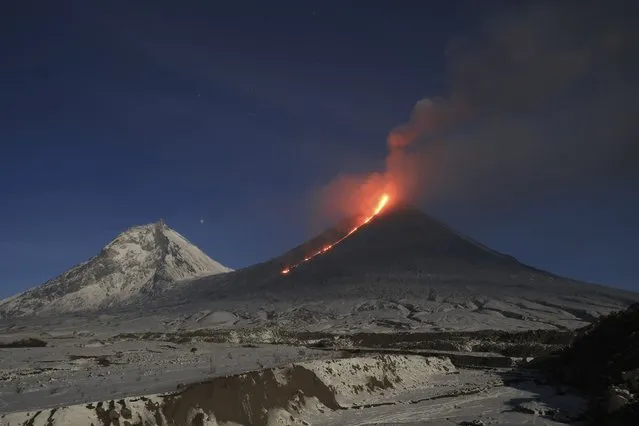 The Klyuchevskoy volcano, one of the highest active volcanoes in the world, erupts in Russia's northern Kamchatka Peninsula, Russian Far Eat, on Saturday, October 28, 2023. Huge ash columns erupted from Eurasia's tallest active volcano on Wednesday, Nov. 1, 2023, forcing authorities to close schools in two towns in the region. (Photo by Yuri Demyanchuk/AP Photo)