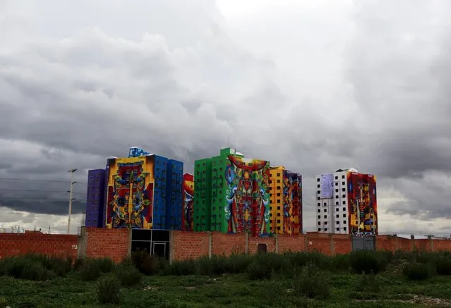 A view of multifamily buildings decorated by painter Roberto Mamani and built by a housing program of Bolivia's President Evo Morales' government in El Alto on the outskirts of La Paz, Bolivia, February 15, 2016. (Photo by David Mercado/Reuters)