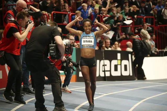 Genzebe Dibaba celebrates after breaking the World Record women 1 Mile event at the Globen Gala athletics meet in Stockholm, Sweden, Wednesday February 17, 2016. Dibaba set a new World Record during the games. (Photo by Soren Andersson /TT via AP Photo)