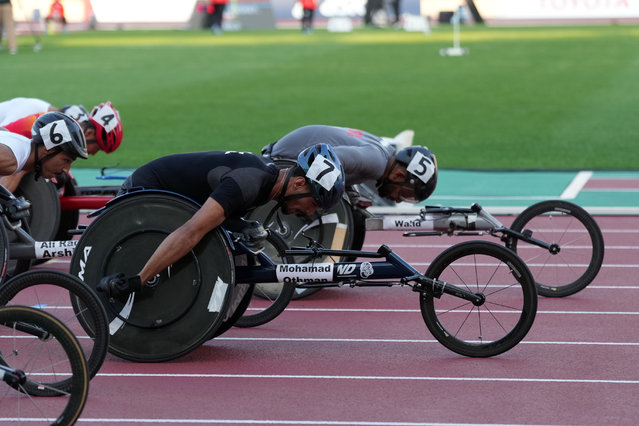 Walid Ktila of Tunisia and Mohamad Othman of the United Arab Emirates lead in the Men's 100m T34 finalduring day five of the World Para Athletics Championships Kobe at Kobe Universiade Memorial Stadium on May 21, 2024 in Kobe, Hyogo, Japan.  (Photo by Toru Hanai/Getty Images)Kyila