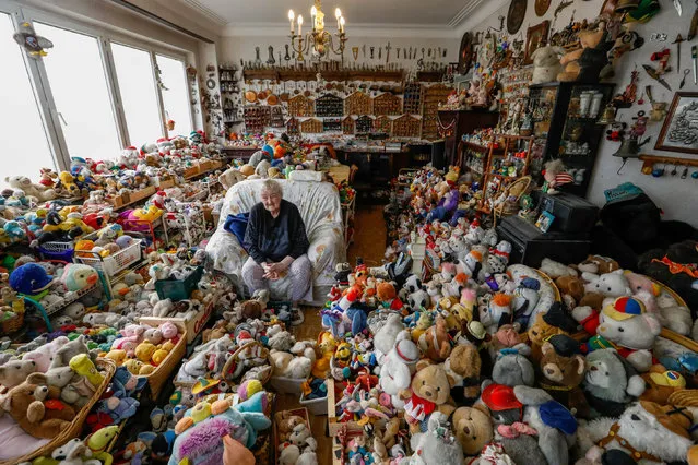 Belgian Catherine Bloemen, 86, sits among more than 20,000 stuffed and plastic toys, she is collecting for more than 65 years, in her house in Brussels, Belgium March 21, 2017. (Photo by Yves Herman/Reuters)