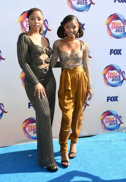 (L-R) Chloe Bailey and Halle Bailey of Chloe X Halle attend FOX's Teen Choice Awards 2019 on August 11, 2019 in Hermosa Beach, California. (Photo by Jon Kopaloff/FilmMagic)