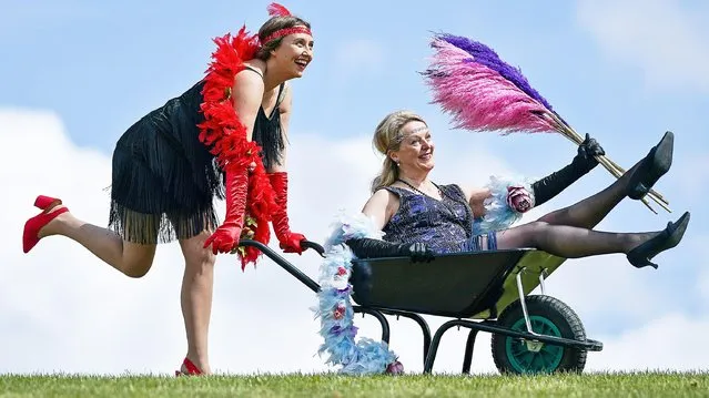 Jessica Fordham (L) and Fiona Fisk pose during a photo-call to promote the 100th year not out anniversary of the Harrogate Flower Show on May 11, 2021 in Harrogate, England. The North of England Horticultural Society (NEHS) is getting ready for the start of the 100th anniversary of the iconic flower show in Harrogate. The Society’s Covid-safe Spring Essentials event, 20-23 May, will be the first major gardening show to take place in 2021 and one of only a handful due to be staged in the UK this year following the impact of Coronavirus. Set in the Great Yorkshire Showground, Spring Essentials will be different from the traditional Harrogate Spring Flower Show, but will include show favourites like gardens, plant displays and sales, garden shopping, crafts, gifts and specialist foods. (Photo by Ian Forsyth/Getty Images)
