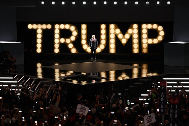 US former President and 2024 Republican presidential candidate Donald Trump arrives onstage to speak during the last day of the 2024 Republican National Convention at the Fiserv Forum in Milwaukee, Wisconsin, on July 18, 2024. Donald Trump will get a hero's welcome Thursday as he accepts the Republican Party's nomination to run for US president in a speech capping a convention dominated by the recent attempt on his life. (Photo by Jim Watson/AFP Photo)