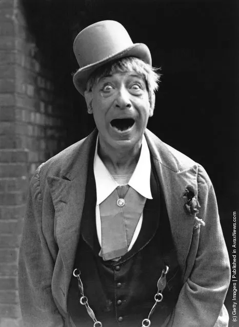 English cockney music hall entertainer Harry Champion (1865 - 1942) publicizing his new role in a music hall revival at the Granada Theatre in East Ham, London, 21st May 1938. Champion is best known for his recordings of songs such as 'Boiled Beef And Carrots' and 'Any Old Iron'