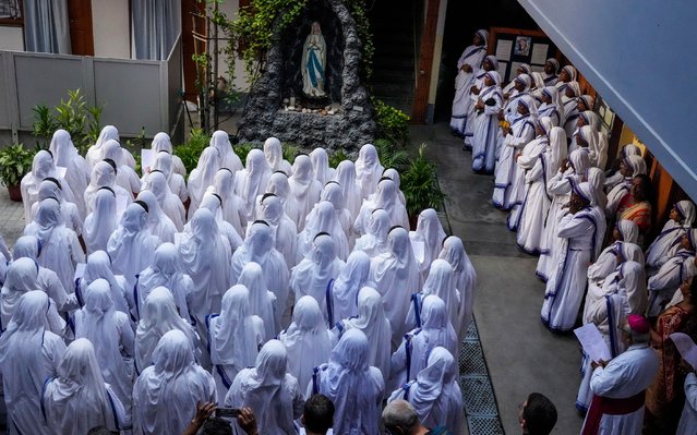 Nuns of the Missionaries of Charity, the order founded by Saint Teresa, chant 'happy feast day' on the saint's death anniversary, in Kolkata, India, Thursday, September 5, 2024. (Photo by Bikas Das/AP Photo)