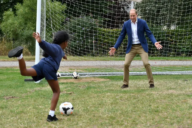 Britain's Prince William joins football practice with children from the Wildcats Girls' football programme, during a reception for the England women's football team, at Kensington Palace in central London, Britain July 13, 2017. (Photo by Dominic Lipinski/Reuters)