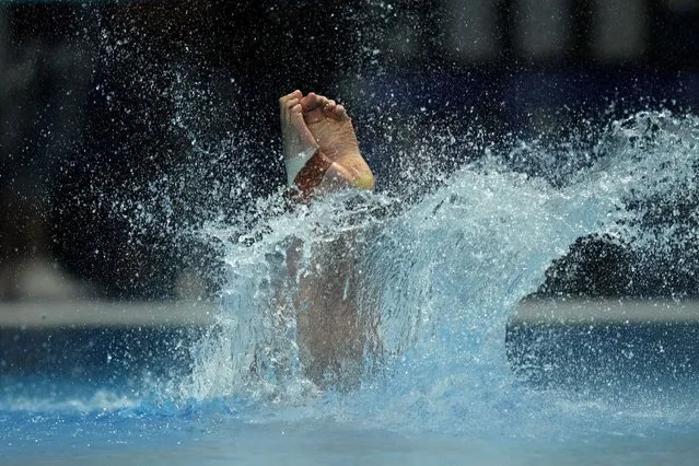 Samuel Fricker, of Australia, competes during the men's diving 10m platform semifinal at the 19th FINA World Championships in Budapest, Hungary, Saturday, July 2, 2022. (Photo by Petr David Josek/AP Photo)