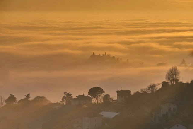 The Spectacular Landscape Of The Po Valley Shrouded In Low Fog Seen From San Vigilio In Upper Bergamo on December 15, 2024. Fog in The Plains and Hills, Bergamo, Italy. (Photo by Luca Ponti/Ipa Agency/Rex Features/Shutterstock)