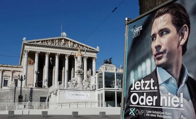 An election campaign poster with Sebastian Kurz of the Peoples' Party (OeVP) is seen opposite the Parliament in Vienna, Austria, October 16, 2017. (Photo by Heinz-Peter Bader/Reuters)