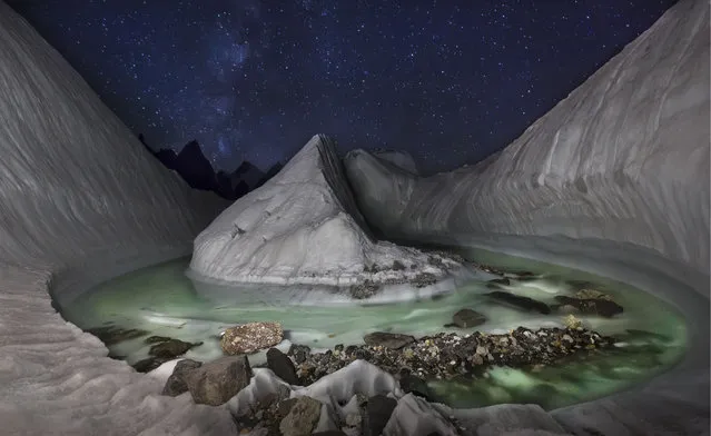 Polish photographer David Kaszlikowski took a series of stunning photographs of a glacier in the Karakoram region near K2, the second highest peak in the world in Himalayas, Pakistan. He sent a drone on flights to scout the surrounding landscape. (Photo by David Kaszlikowski/Rex Features)