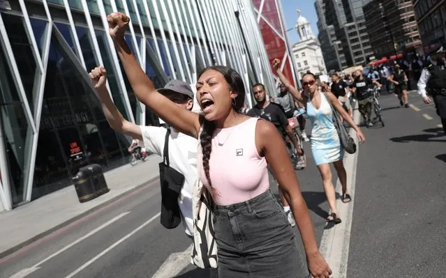 Protesters take part in a 'Black Lives Matter' demonstration on June 01, 2020 in London, England. Protests and riots continue across American following the death of George Floyd, who died after being restrained by Minneapolis police officer Derek Chauvin. Chauvin, 44, was charged last Friday with third-degree murder and second-degree manslaughter. (Photo by Dan Kitwood/Getty Images)