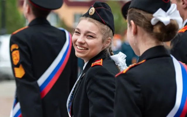 School leavers celebrate the end of their final academic year during a Last Bell ceremony at Yuzhno-Sakhalinsk's Cadet School in Yuzhno-Sakhalinsk, Russia on June 5, 2020. (Photo by Sergei Krasnoukhov/TASS)