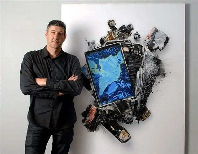 Artist Destroys Apple Products