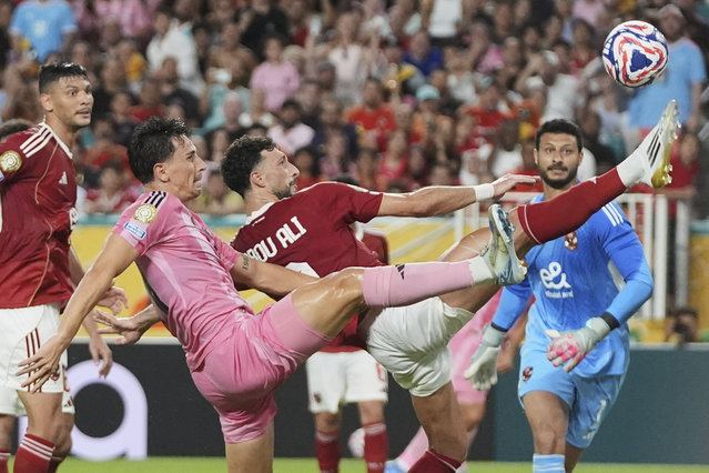 Inter Miami's Tadeo Allende and Al Ahly's Wessam Abou Ali compete for the ball during the Club World Cup group A soccer match between Al Ahly and Inter Miami in Miami, Fla., Saturday, June 14, 2025. (Photo by Lynne Sladky/AP Photo)
