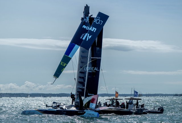 The France SailGP team, helmed by Quentin Delapierre, suffer a damaged wing on race day one of the Great Britain Sail Grand Prix in Portsmouth, UK on July 19, 2025. (Photo by Ricardo Pinto/SailGP via Reuters)